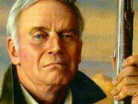 Charlton Heston in una foto per la National Rifle Foundation, istituzione finanziata dalla lobby dei costruttori di armi americani